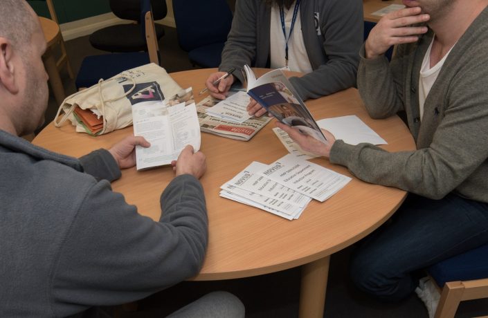 Learners sitting studying at table