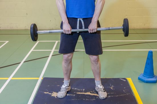 Lifting weights in the gym