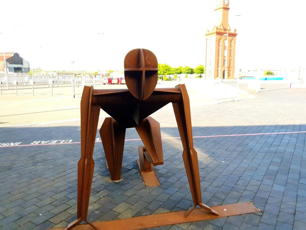 Paul's sculpture of an athlete on a starting block stands outside Middlesborough College.
